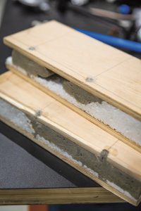 Bij het onderdeel opbouw komt ook de reparatie van de vloer en wanden aan de orde