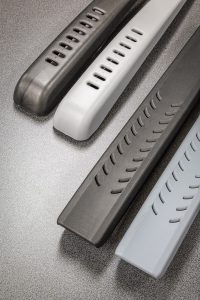 Ieder gaatje is een 'trap' in de verschuifbare armleuning